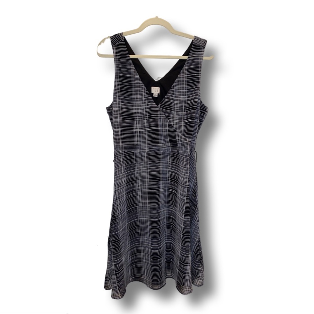 A new day. Black and white patterned dress